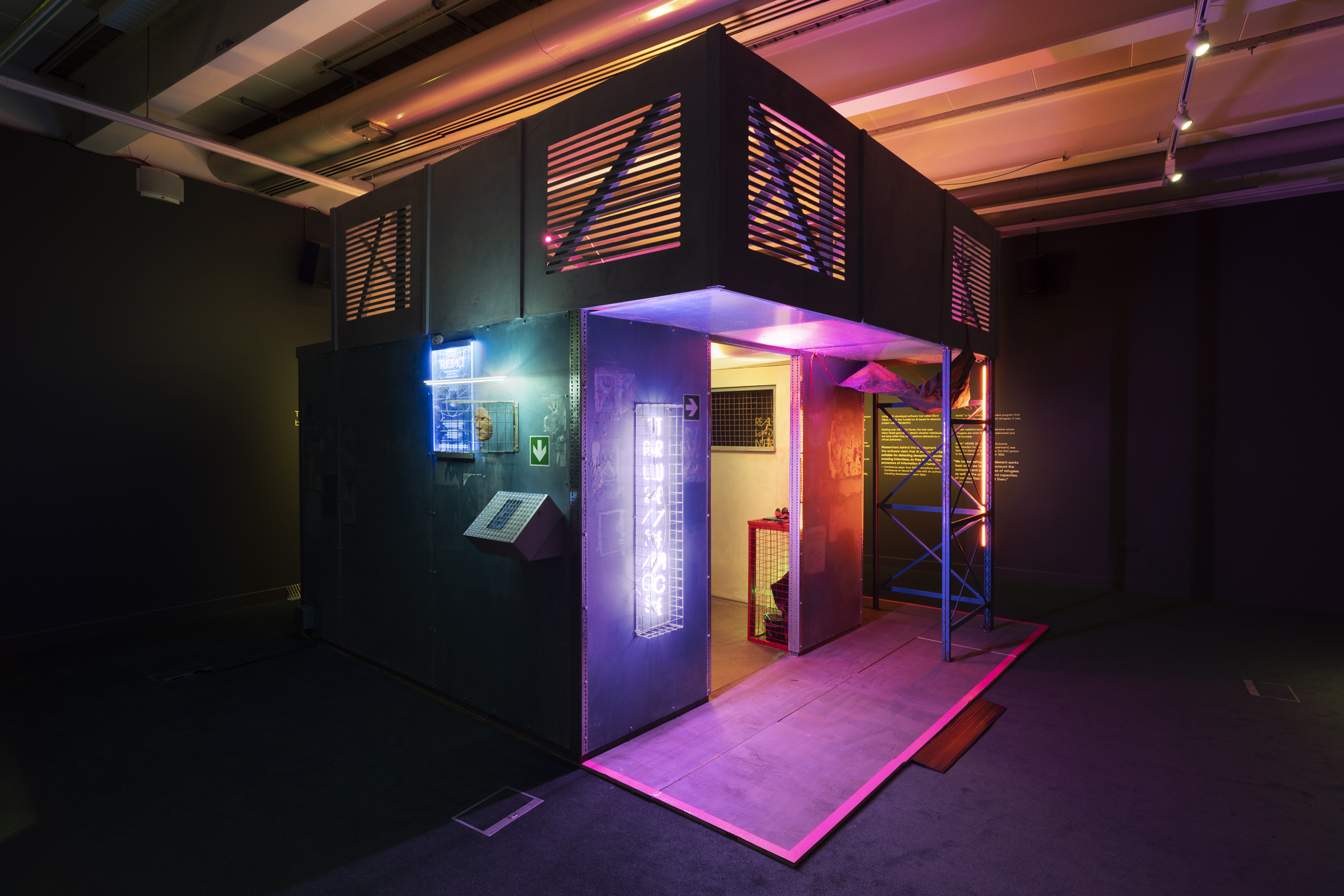 "A Face to Open Doors" - at IWM London.

Created by award-winning artists Anagram, you will be taken into an imaginary future world where international movement is policed by intelligent machines. You will meet a border guard driven by artificial intelligence (AI). Your face is your passport. How you use it during your meeting will inform where you are sent.

Commissioned by IWM, this immersive experience invites you to reflect on the labyrinthine systems currently used to process people fleeing conflict.

Photographed 31st July 2020.